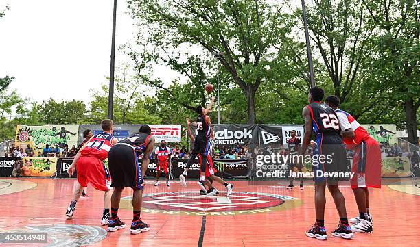 Reebok Breakout Camp All Star players compete against EBC Rucker Park All Star players at the 2014 Reebok Classic Experience at EBC Rucker Park on...