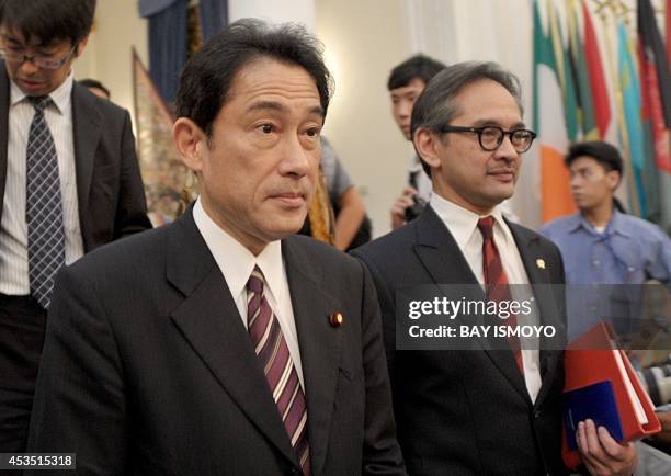 Indonesian Foreign Minister Marty Natalegawa meets his Japanese counterpart Fumio Kishida in Jakarta on August 12, 2014. Kishida, who is on a two-day...