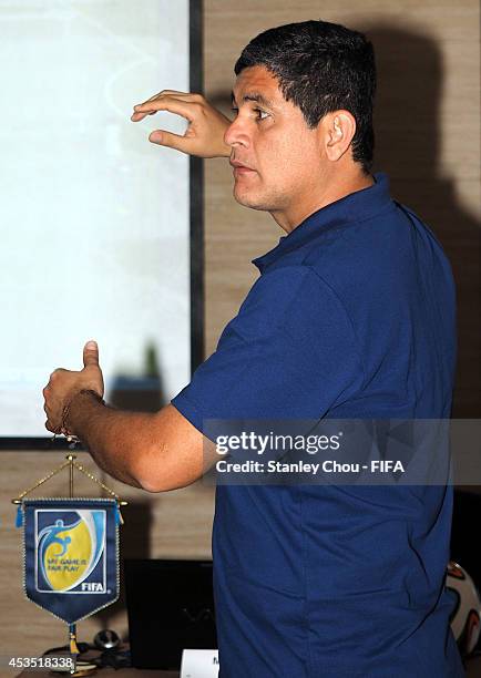 Referees instructor Oscar Julian Ruiz Acosta of Columbia reacts during the FIFA Referees and Assistant Referees Thieory Course at the Hilton Hotel...