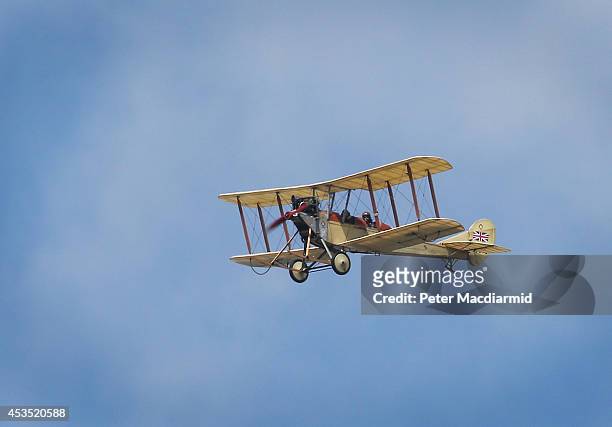 Replica BE-2 biplane of the Royal Flying Corp comes into land on August 12, 2014 in Headcorn, England. To commemorate 100 years since the first...