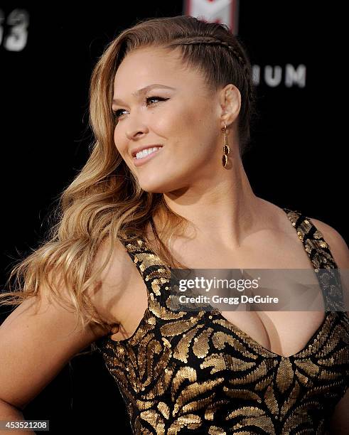 Actress/MMA fighter Ronda Rousey arrives at the Los Angeles premiere of "The Expendables 3" at TCL Chinese Theatre on August 11, 2014 in Hollywood,...