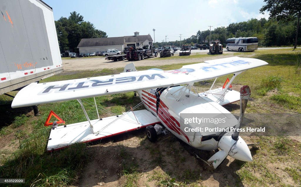 William Billy Werth cleans his belongings out of his plane a day after crashing