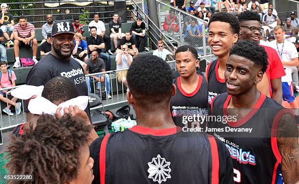 Shaquille O'Neal supports the Reebok Breakout Camp All Star players at the 2014 Reebok Classic Experience at EBC Rucker Park on August 11, 2014 in...