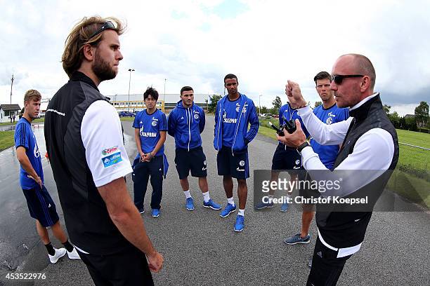 Test drivers explain the players of Schalke the test drives at driving safety centre Rheinberg on August 12, 2014 in Rheinberg, Germany.