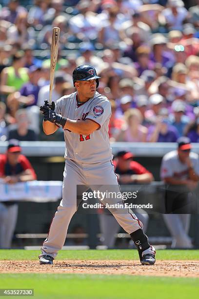 Kendrys Morales of the Minnesota Twins bats against the Colorado Rockies at Coors Field on July 13, 2014 in Denver, Colorado. The Twins defeated the...
