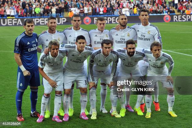 Real Madrid team Real Madrid's goalkeeper Iker Casillas, Real Madrid's defender Sergio Ramos, Real Madrid's Portuguese defender Pepe, Real Madrid's...