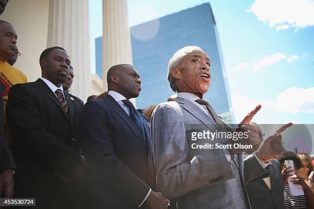 Civil rights leader Rev. Al Sharpton speaks about the killing of teenager Michael Brown at a press conference held on the steps of the old courthouse...