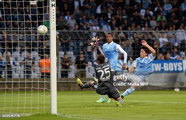 Peter Kurzweg of TSV 1860 Muenchen scores his team's first goal during the Regionalliga match between TSV 1860 Muenchen II and FC Bayern Muenchen II...