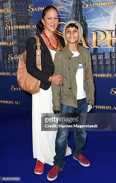 Allegra Curtis and her son Raphael attend the Munich premiere of the film 'Saphirblau' at Mathaeser Filmpalast on August 12, 2014 in Munich, Germany.