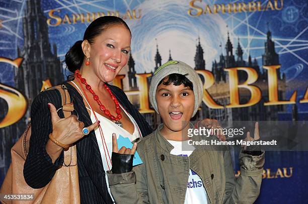Allegra Curtis and her son Raphael attend the Munich premiere of the film 'Saphirblau' at Mathaeser Filmpalast on August 12, 2014 in Munich, Germany.