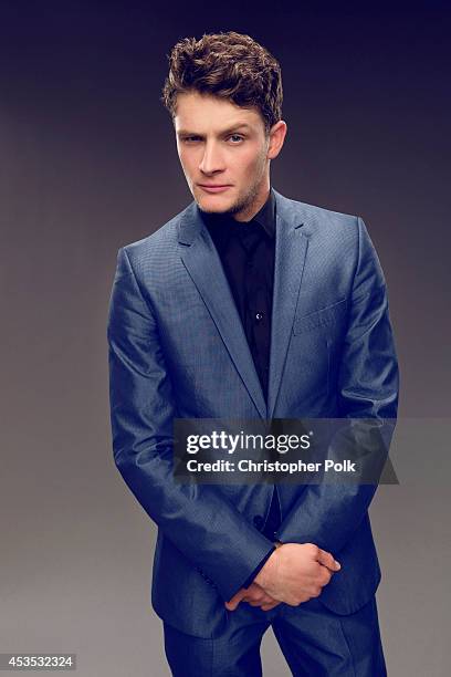 Actor Brett Dier poses for a portrait at the CW network panel at the Summer 2014 TCAs on July 18, 2014 in Beverly Hills, California.