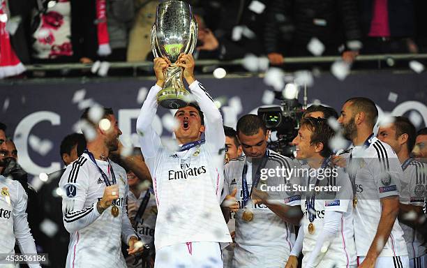 Real Madrid player Ronaldo lifts the trophy after the UEFA Super Cup match between Real Madrid and Sevilla FC at Cardiff City Stadium on August 12,...