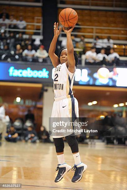 Danni Jackson of the George Washington Colonials takes a jump shot during a womens college basketball game against the California Golden Bears on...