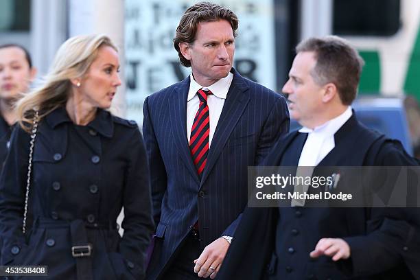 Suspended Essendon Bombers coach James Hird arrives with wife Tania Hird at the Supreme Court ahead of the case looking into the AFL-ASADA...