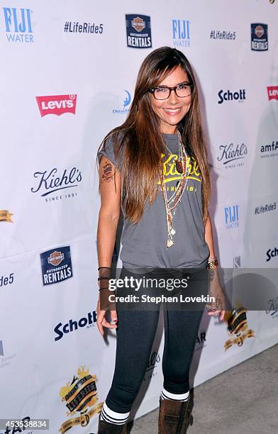 Actress Vanessa Marcil attends Kiehl's LifeRide for amfAR co-hosted by FIJI Water on August 12, 2014 in New York City.