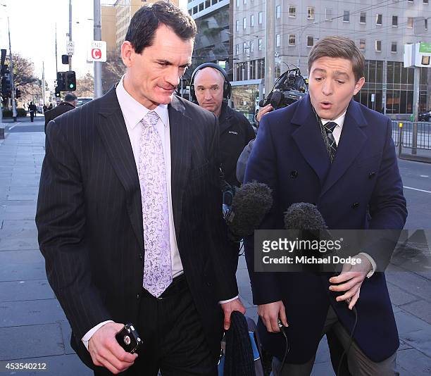 Investigator Aaron Walker is question by media after leaving the Supreme Court from the case looking into the AFL-ASADA Investigation into the...