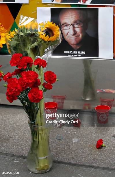 Makeshift memorial for Robin Williams seen in front of Carolines on Broadway comedy club on August 12, 2014 in New York City.