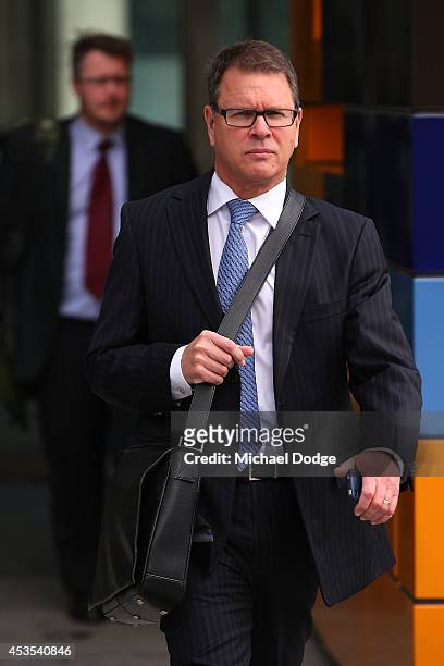 Investigator Trevor Burgess leaves the Supreme Court from the case looking into the AFL-ASADA Investigation into the alleged use of banned substances...