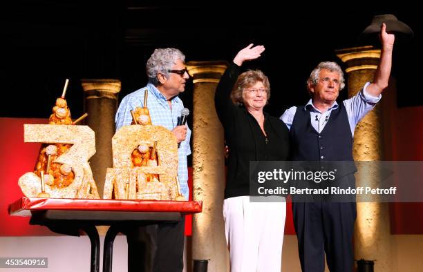 Singer Enrico Macias, President of Ramatuelle Festival Jacqueline Franjou and Artistic Director of the Festival Michel Boujenah pose near a Birthday...