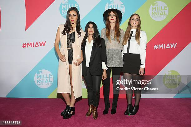 Alejandra Moreno, Daniela Sanchez, Carla Sarinana, Alicia Emerson of Ruido Rosa attend the MTV Millennial Awards 2014 red carpet at Pepsi Center WTC...