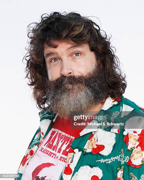 WWEs Hardcore Legend, Mick Foley poses before his performance at The Ice House Comedy Club on August 12, 2014 in Pasadena, California.