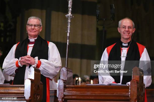 The Archbishop of Canterbury, Justin Welby and Archbishop Philip Freier smile as they attend the inauguration service of Melbourne Archbishop Philip...