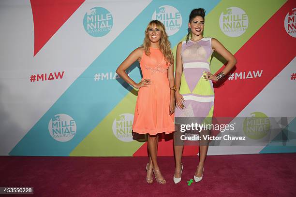 Ashley Perez and Hanna Perez of Ha-Ash attend the MTV Millennial Awards 2014 red carpet at Pepsi Center WTC on August 12, 2014 in Mexico City, Mexico.