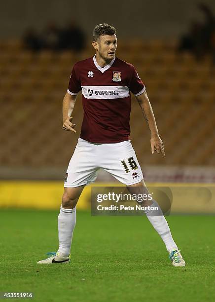 Zander Diamond of Northampton Town in action during the Capital One Cup First Round match between Wolverhampton Wanderers and Northampton Town at...