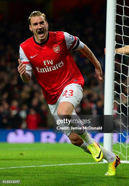 Nicklas Bendtner of Arsenal celebrates scoring the opening goal during the Barclays Premier League match between Arsenal and Hull City at Emirates...