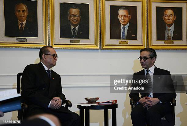 North Korea's Foreign Minister Ri Su Yong meets with his Indonesian counterpart Marty Natalegawa at the Ministry of Foreign Affairs building in...