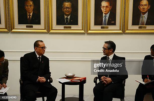 North Korea's Foreign Minister Ri Su Yong meets with his Indonesian counterpart Marty Natalegawa at the Ministry of Foreign Affairs building in...