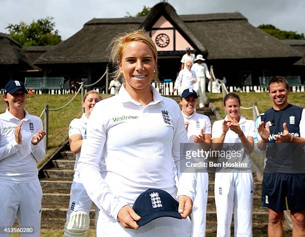 England debutant Lauren Winfield recieves her cap prior to day one of Women's test match between England and India at Wormsley Cricket Ground on...
