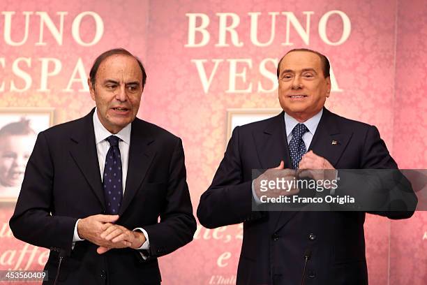 Journalist Bruno Vespa and former Prime Minister Silvio Berlusconi attend the launch of Bruno Vespa's book 'Sale, Zucchero e Caffe' at the hall of...