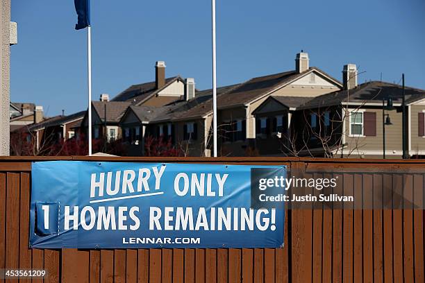 Sign advertising available homes is posted at a housing development on December 4, 2013 in Dublin, California. According to a Commerce Department...