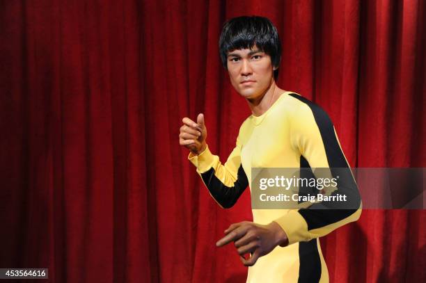 Madame Tussauds New York welcomes Bruce Lee's wax figure for a limited time at Madame Tussauds on August 13, 2014 in New York City.