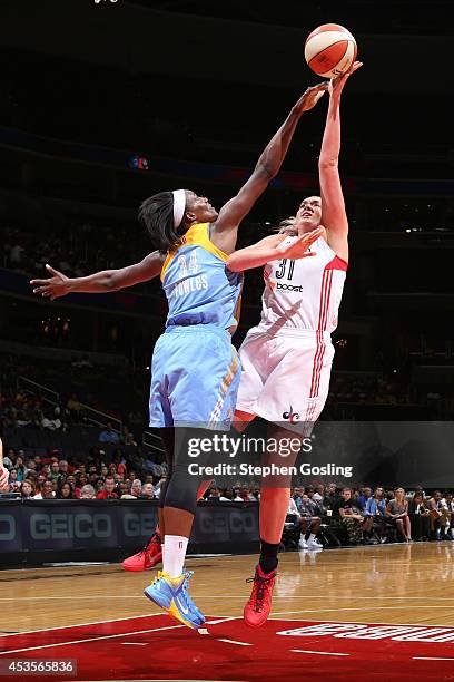 Stefanie Dolson of the Washington Mystics shoots against Sylvia Fowles of the Chicago Sky at the Verizon Center on August 13, 2014 in Washington, DC....