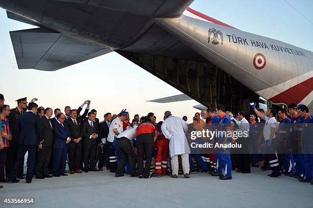 Turkey's Deputy Prime Minister Besir Atalay, Health Minister Mehmet Muezzinoglu, Turkish Prime Ministry Disaster & Emergency Management Presidency's...