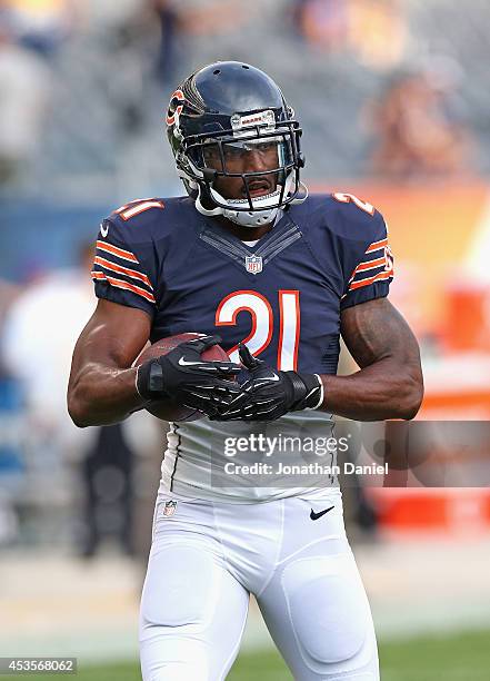 Ryan Mundy of the Chicago Bears participates in warm-ups before a preseason game against the Philadelphia Eagles at Soldier Field on August 8, 2014...