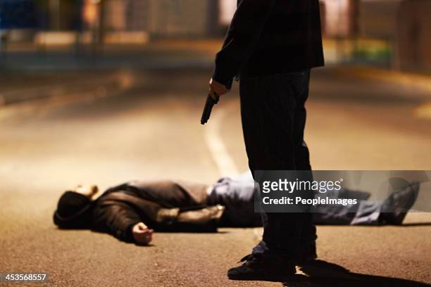 acts of violence - killing stock pictures, royalty-free photos & images