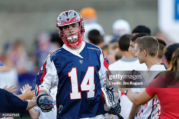 Ryan Boyle of the Boston Cannons enters the field before a game with the Rochester Rattlers at Harvard Stadium on August 9, 2014 in Boston,...