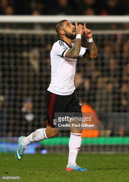 Ashkan Dejagah of Fulham celebrates as he scores their first goal during the Barclays Premier League match between Fulham and Tottenham Hotspur at...