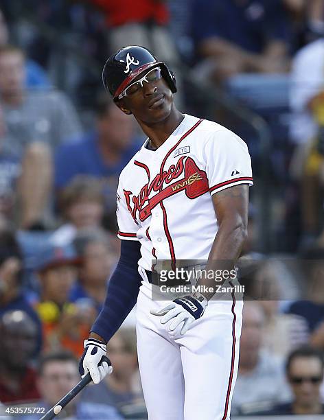 Centerfielder B.J Upton of the Atlanta Braves reacts after striking out in the second inning of the game against the Los Angeles Dodgers at Turner...