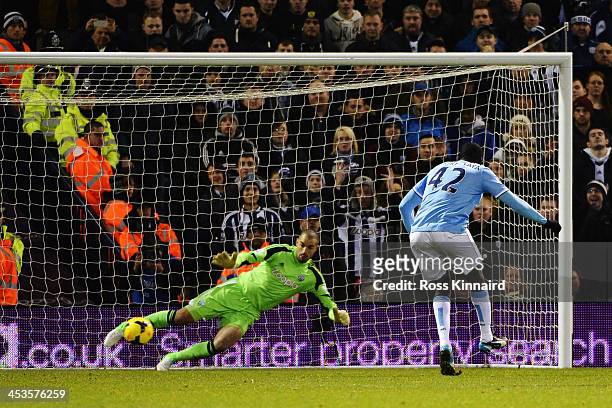 Yaya Toure of Manchester City scores from the penalty spot past Boaz Myhill the West Bromwich Albion goalkeeper during the Barclays Premier League...