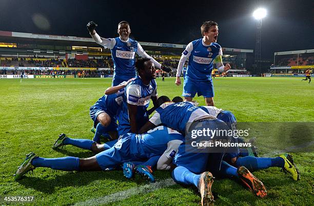 Khaleem Hyland of Krc Genk and team mates Bennard Kumordzi and Jelle Vossen celebrate during the Belgian Cup match between KV Mechelen and KRC Genk...