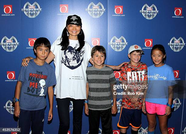 Irina Pantaeva and guest attend Marvel Universe LIVE! NYC World Premiere on August 13, 2014 in New York City.