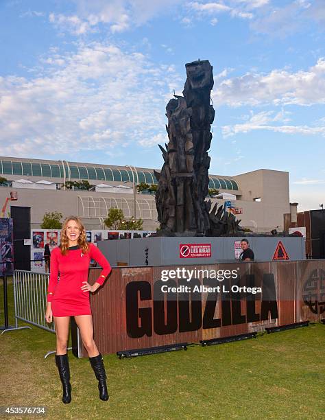 Actress Maitland Ward cosplays a red shirt from 'Star Trek' on Saturday Day 3 of Comic-Con International 2014 at The Godzilla display at The...