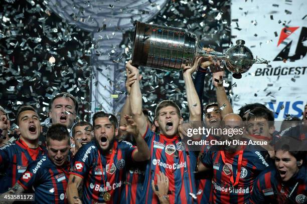 Players of San Lorenzo celebrate winning the Copa Libertadores after the second leg final match between San Lorenzo and Nacional as part of Copa...