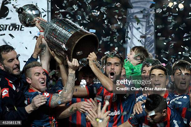 Players of San Lorenzo celebrate winning the Copa Libertadores after the second leg final match between San Lorenzo and Nacional as part of Copa...