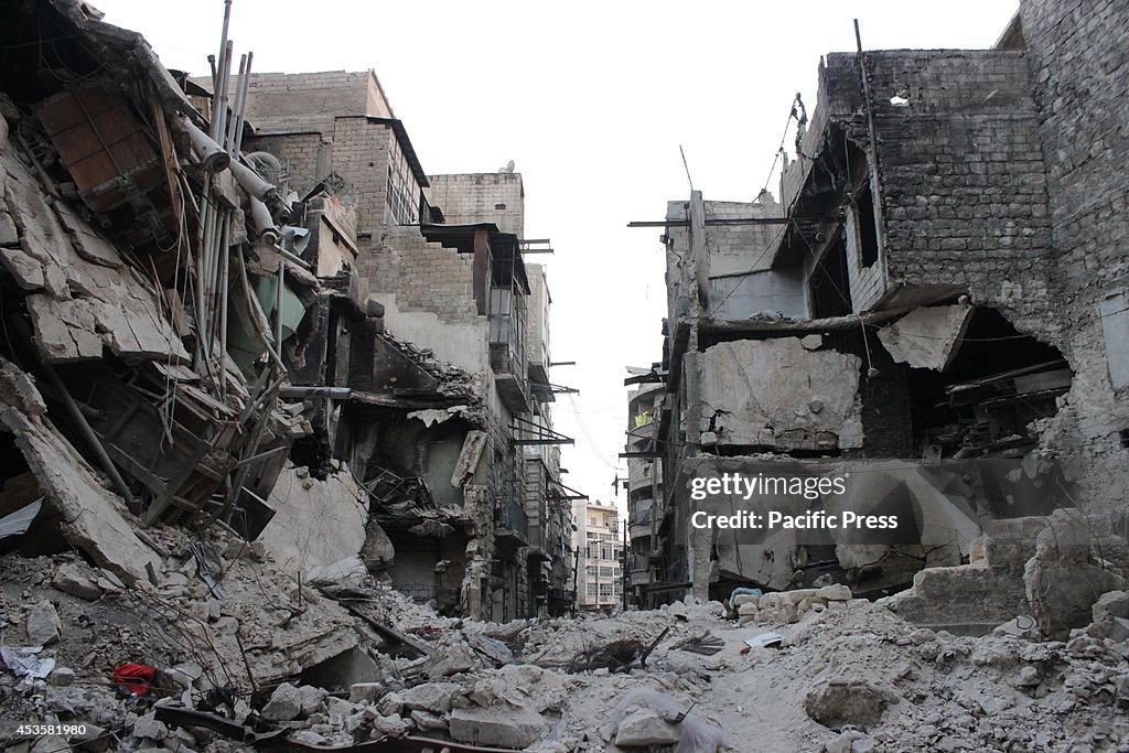 A view of a damaged buildings after barrel bomb was dropped...