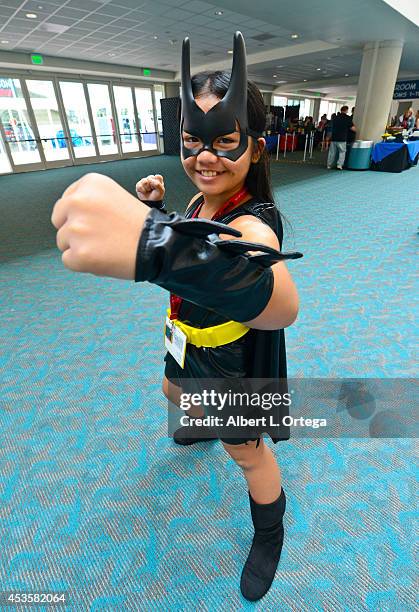 Cosplayer dressed as Batgirl on Day 1 of Comic-Con International at the San Diego Convention Center on July 24, 2014 in San Diego, California.